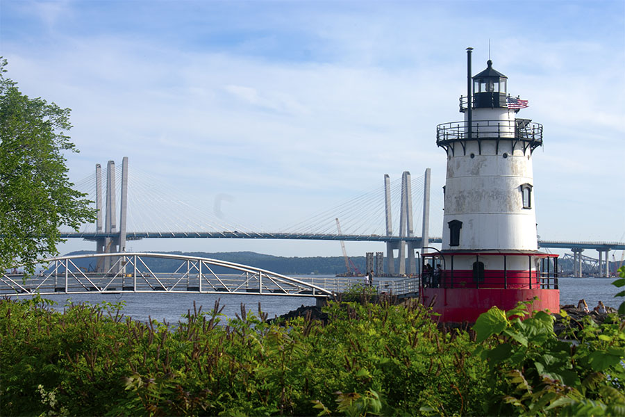 Blog - View of a Bridge and Surrounding Lighthouse By the Hudson River on a Sunny Day in Westchester New York
